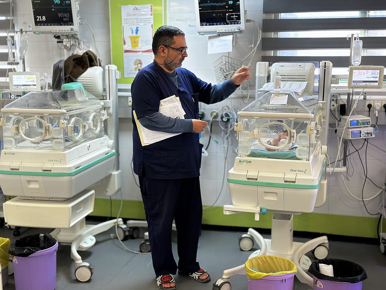 Doctors and healthcare workers in Al-Nasser Hospital treat a certain number of babies who are suffering from hypothermia, Khan Younis, Gaza Strip, Dec. 18, 2025. (Activestills/Doaa Albaz)