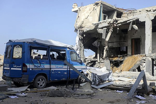 Palestinians inspect the site of an Israeli strike on a police station in Gaza City's Sheikh Radwan neighborhood, January 31, 2026. (Yousef Zaanoun/Activestills) Palestinians inspect the site of an Israeli strike on a police station in Gaza City's Sheikh Radwan neighborhood, January 31, 2026. (Yousef Zaanoun/Activestills)
