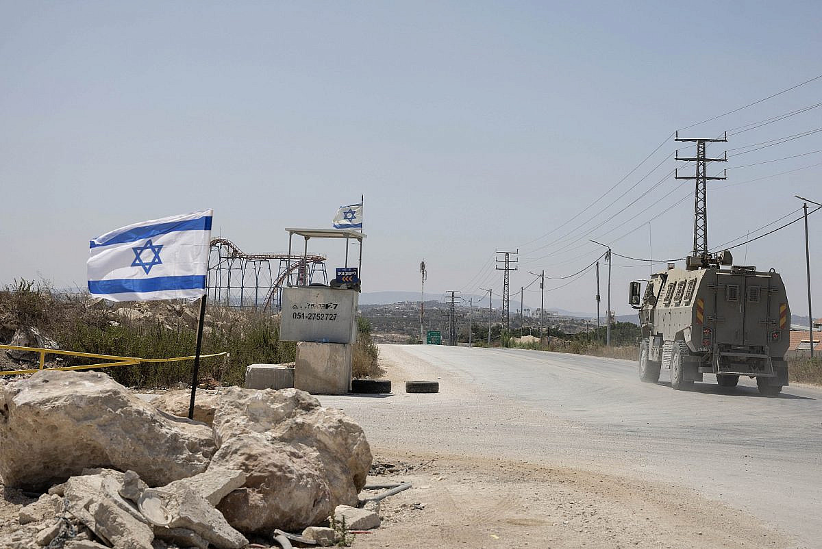 An Israeli military vehicle at the re-established Ganim settlement near the West Bank city of Jenin, which was dismantled in 2005 as part of Israel's 'disengagement' from Gaza, August 13, 2026. (Oren Ziv) An Israeli military vehicle at the re-established Ganim settlement near the West Bank city of Jenin, which was dismantled in 2005 as part of Israel's 'disengagement' from Gaza, August 13, 2026. (Oren Ziv)