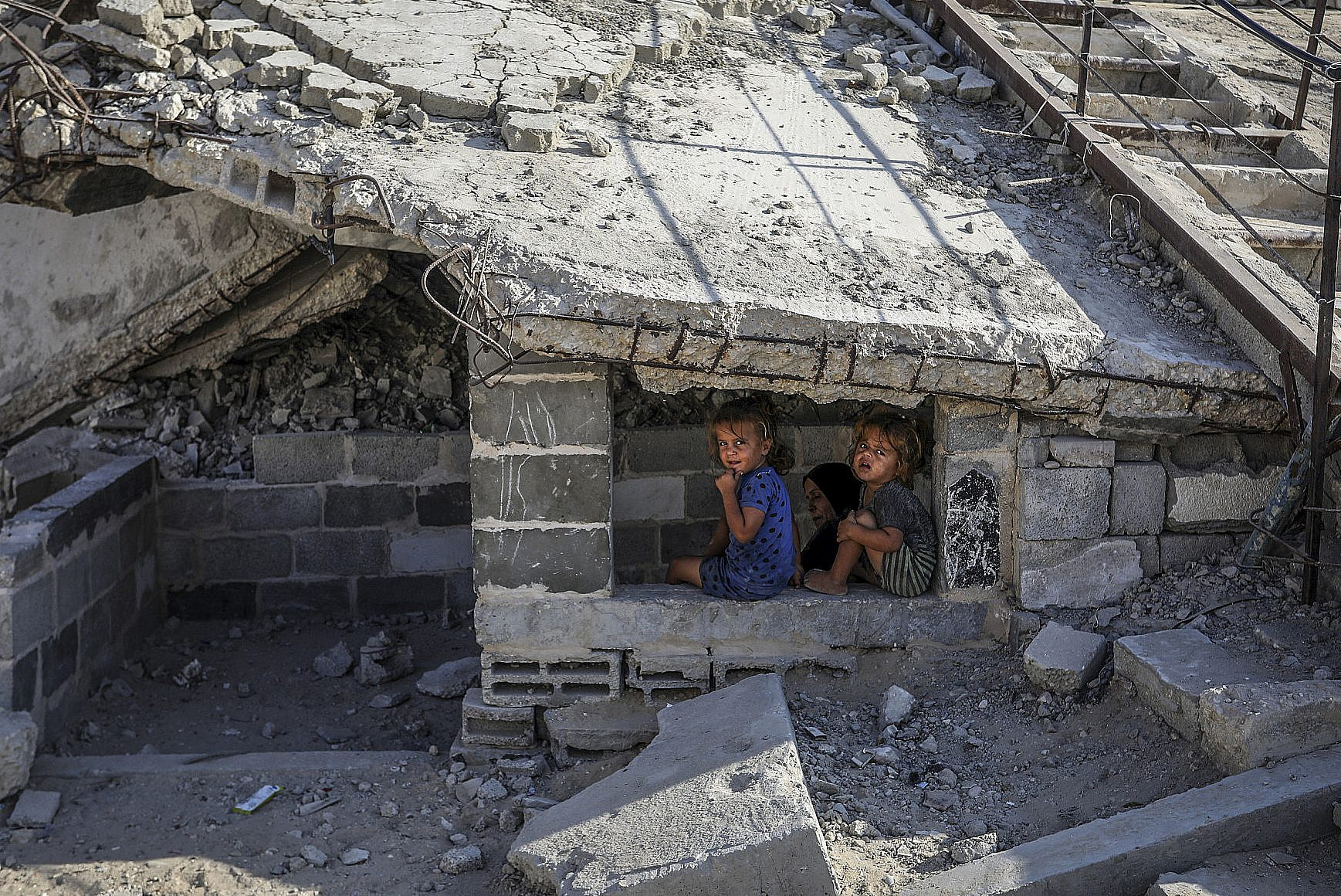 Palestinian children return to their home after it was destroyed by the Israeli army, in Khan Younis, southern Gaza, November 1, 2025. (Abed Rahim Khatib/Flash90) Palestinian children return to their home after it was destroyed by the Israeli army, in Khan Younis, southern Gaza, November 1, 2025. (Abed Rahim Khatib/Flash90)