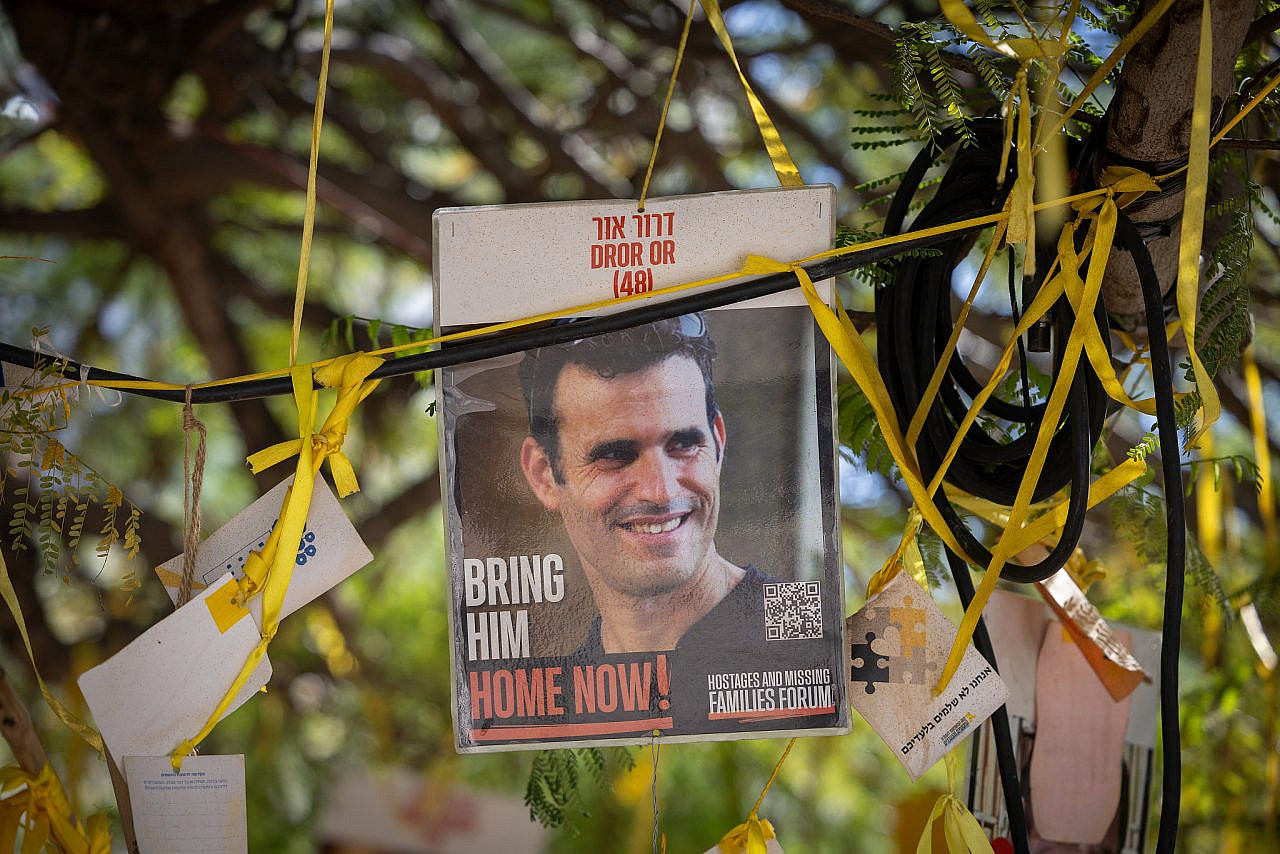 A picture of slain hostage Dror Or, whose body was returned from the Gaza Strip as part of a ceasefire agreement between Israel and Hamas, is placed at Hostage Square in Tel Aviv, November 26, 2025. (Miriam Alster/Flash90)