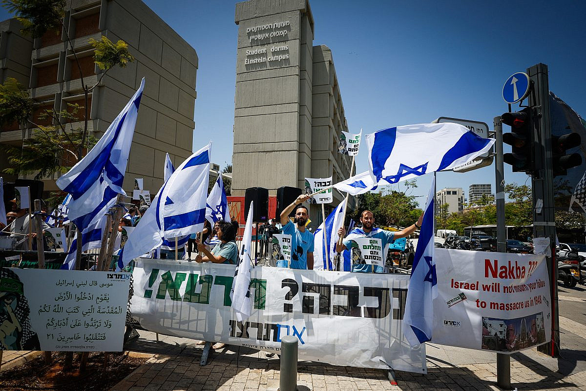 Israeli activists from the right-wing Im Tirtzu movement demonstrate next to Arab-Israeli and left-wing activist students during a rally marking the Nakba anniversary at Tel Aviv University, May 13, 2026. (Jamal Awad/Flash90) Israeli activists from the right-wing Im Tirtzu movement demonstrate next to Arab-Israeli and left-wing activist students during a rally marking the Nakba anniversary at Tel Aviv University, May 13, 2026. (Jamal Awad/Flash90)