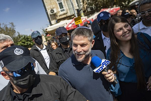 Finance Minister and Religious Zionist Party chairman Bezalel Smotrich tours the Mahane Yehuda Market as part of the party’s election campaign, in Jerusalem, October 9, 2026. (Chaim Goldberg/Flash90)