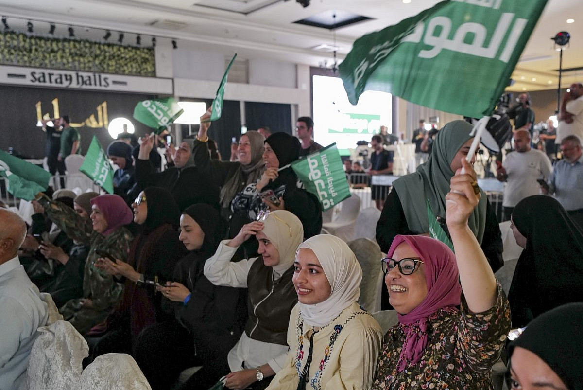 Supporters of the United Arab List (Ra’am) party gather following the release of exit poll results in the northern Israeli city of Sakhnin, on Israel’s general election night, October 27, 2026. Photo (Michael Giladi/Flash90)