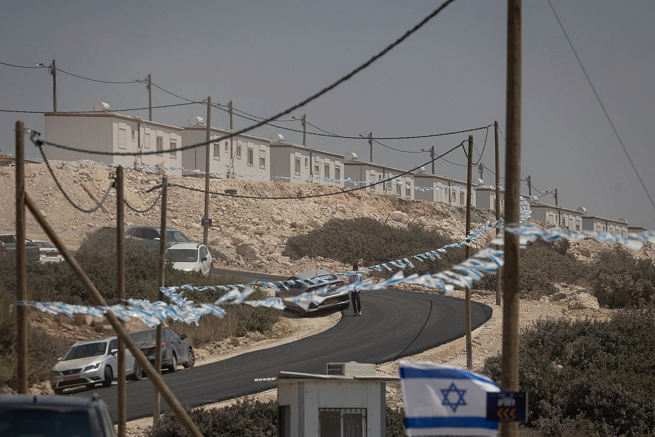 Israeli settlers during the re-establishment of the Ganim settlement near the West Bank city of Jenin, which was dismantled in 2005 as part of Israel's 'disengagement' from Gaza, August 13, 2026. (Oren Ziv/Activestills)